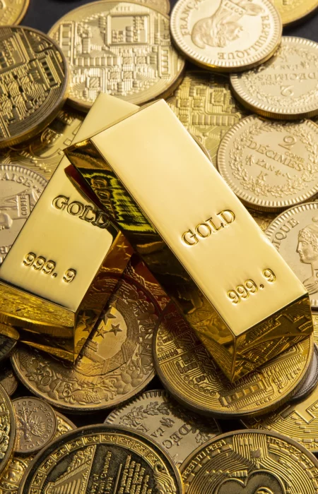 Goldbarren und Goldmünzen als krisensichere Geldanlage.